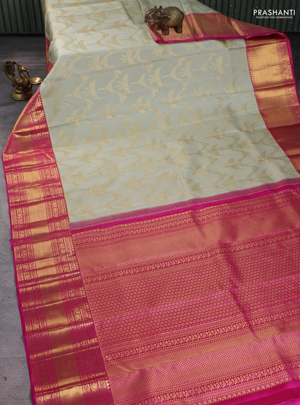Pure kanchipuram silk saree pastel green and pink with allover zari woven brocade weaves and long zari woven border
