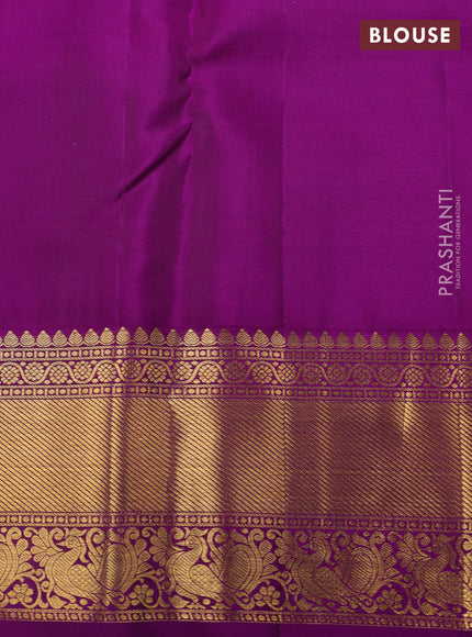 Pure kanchipuram silk saree cream and purple with allover zari checks & butta weaves and rich zari woven border