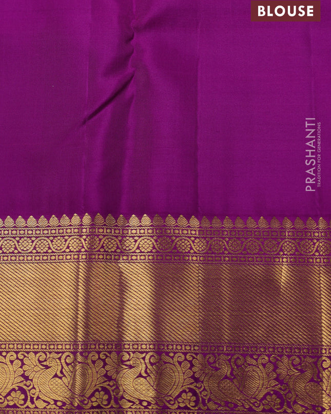 Pure kanchipuram silk saree cream and purple with allover zari checks & butta weaves and rich zari woven border