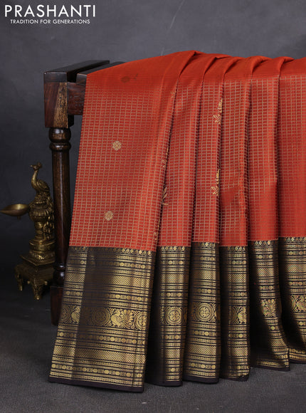 Pure kanchipuram silk saree rustic orange and coffee brown with allover zari checks & buttas and long zari woven border