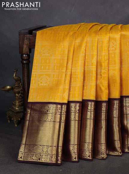 Pure kanchipuram silk saree yellow and coffee brown with allover zari checks & buttas and long zari woven border