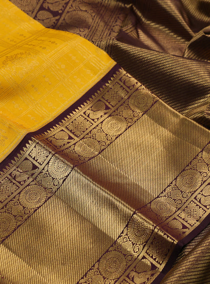 Pure kanchipuram silk saree yellow and coffee brown with allover zari checks & buttas and long zari woven border