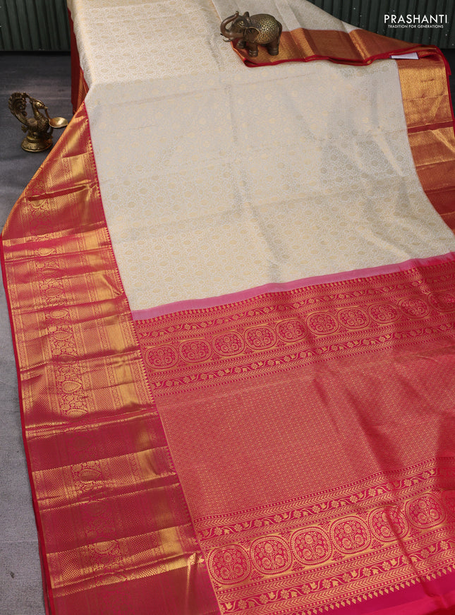 Pure kanchipuram silk saree off white and red with allover zari woven brocade weaves and long zari woven border