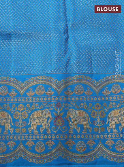 Pure kanchipuram silk saree yellow and cs blue with allover zari woven brocade weaves and long zari woven elephant border