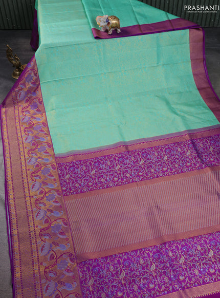 Pure kanchipuram silk saree teal green and purple with allover zari woven brocade weaves and long zari woven paithani style border
