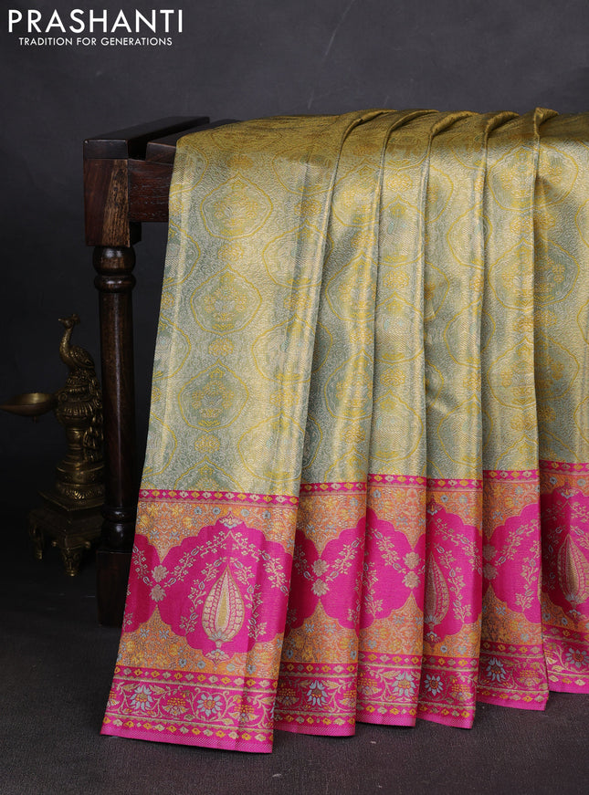 Pure kanchipuram tissue silk saree pastel green and pink with allover zari woven brocade weaves and long zari woven meenakari border