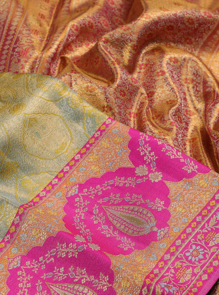 Pure kanchipuram tissue silk saree pastel green and pink with allover zari woven brocade weaves and long zari woven meenakari border