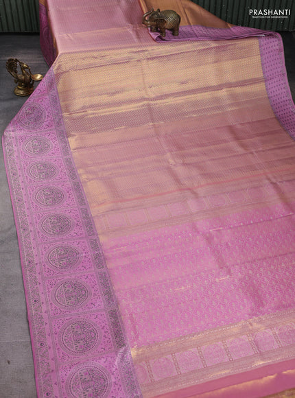Pure kanchipuram tissue silk saree light pink and lotus pink with allover zari woven brocade weaves and long zari woven meenakari border