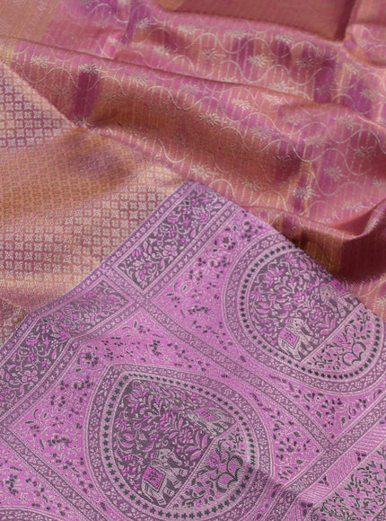 Pure kanchipuram tissue silk saree light pink and lotus pink with allover zari woven brocade weaves and long zari woven meenakari border