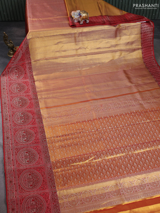 Pure kanchipuram tissue silk saree gold and red with allover zari woven brocade weaves and long zari woven meenakari border