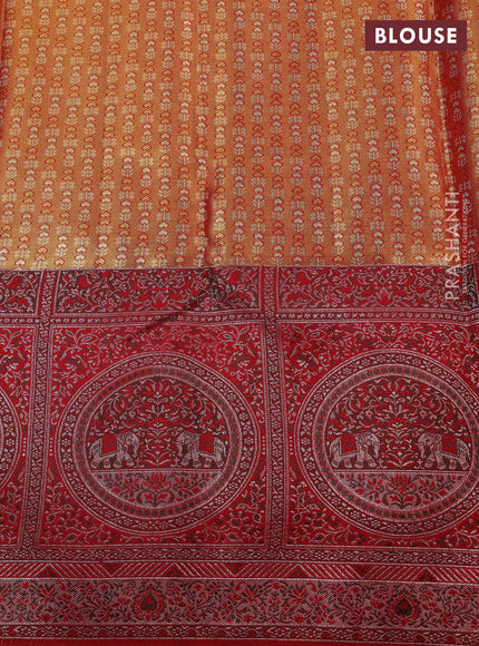 Pure kanchipuram tissue silk saree gold and red with allover zari woven brocade weaves and long zari woven meenakari border