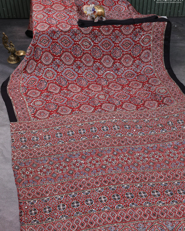 Modal silk saree maroon and black with allover ajrakh prints & sequin work and mirror sequin work pallu