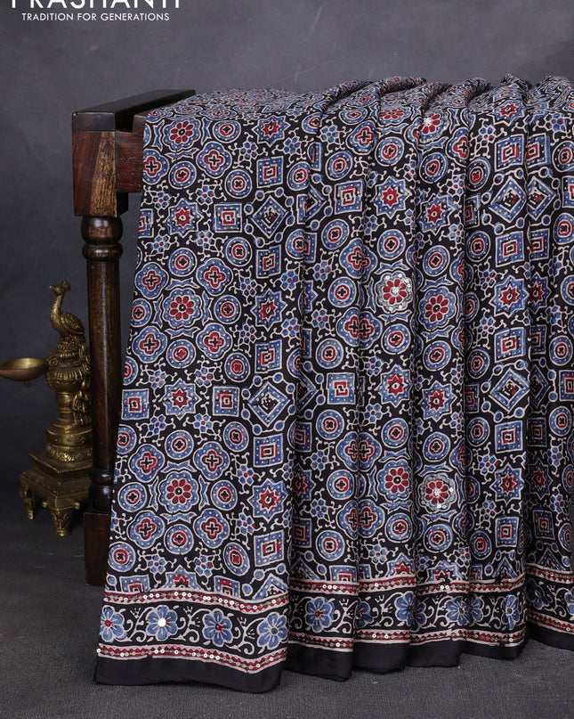 Modal silk saree black with allover ajrakh prints & sequin work and mirror sequin work pallu
