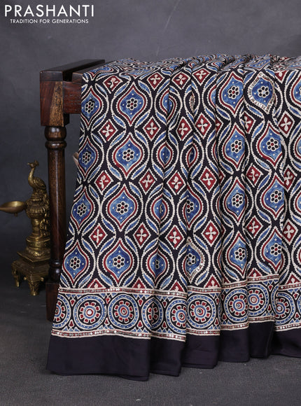 Modal silk saree black with allover ajrakh prints & sequin work and mirror sequin work pallu