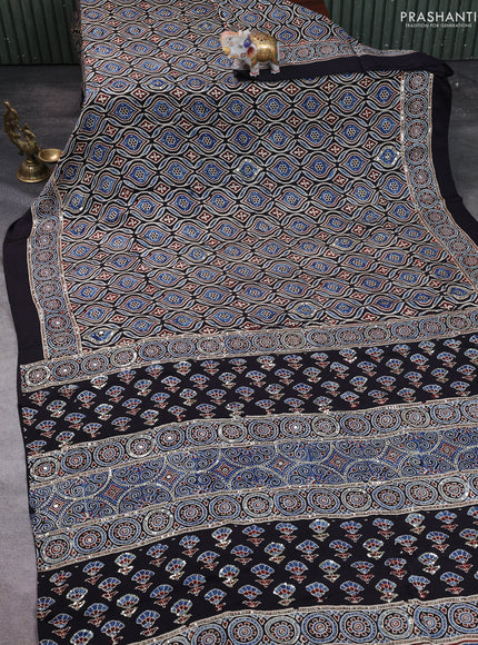 Modal silk saree black with allover ajrakh prints & sequin work and mirror sequin work pallu