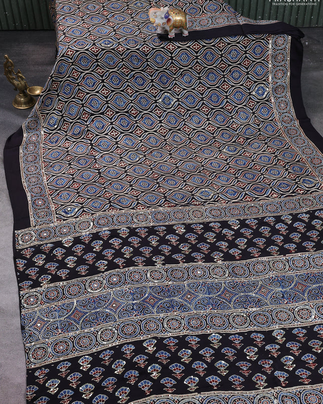 Modal silk saree black with allover ajrakh prints & sequin work and mirror sequin work pallu