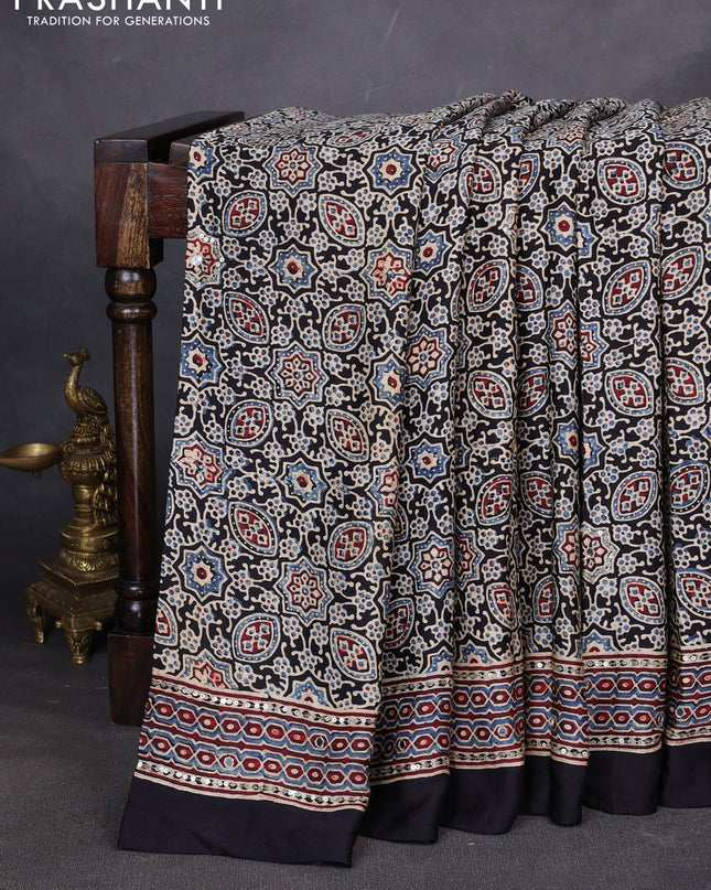 Modal silk saree black with allover ajrakh prints & sequin work and mirror sequin work pallu