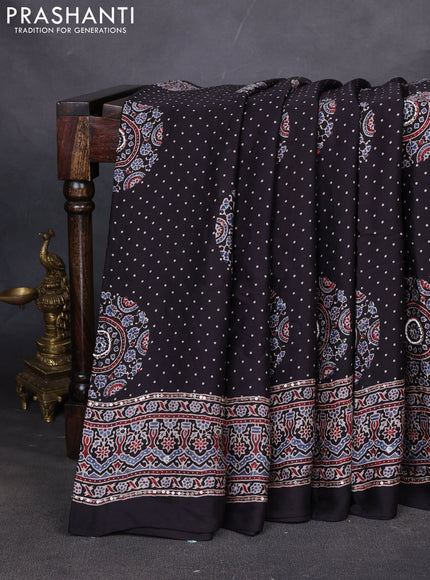 Modal silk saree black with allover ajrakh prints & sequin work and mirror sequin work pallu