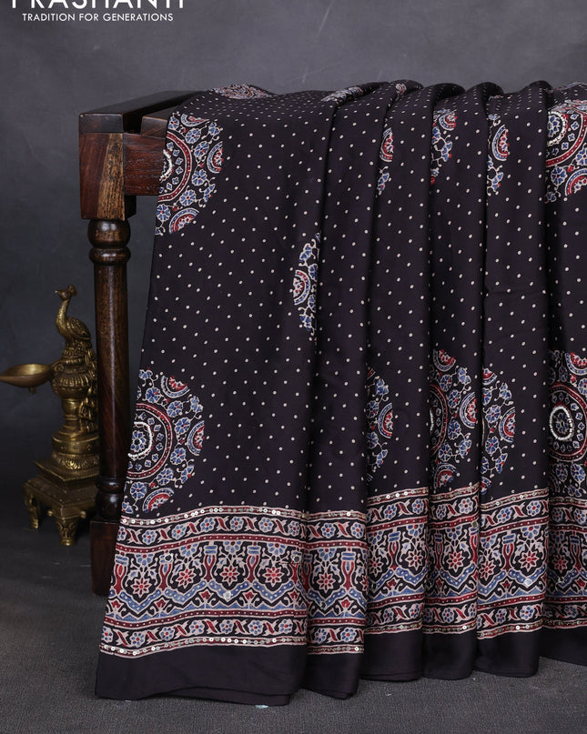 Modal silk saree black with allover ajrakh prints & sequin work and mirror sequin work pallu