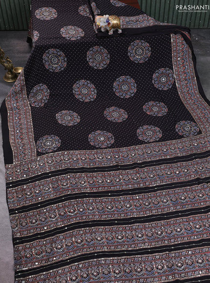 Modal silk saree black with allover ajrakh prints & sequin work and mirror sequin work pallu
