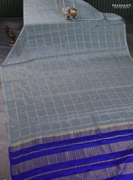 Pure mysore silk saree pastel blue shade and royal blue with allover zari checks & buttas in borderless style