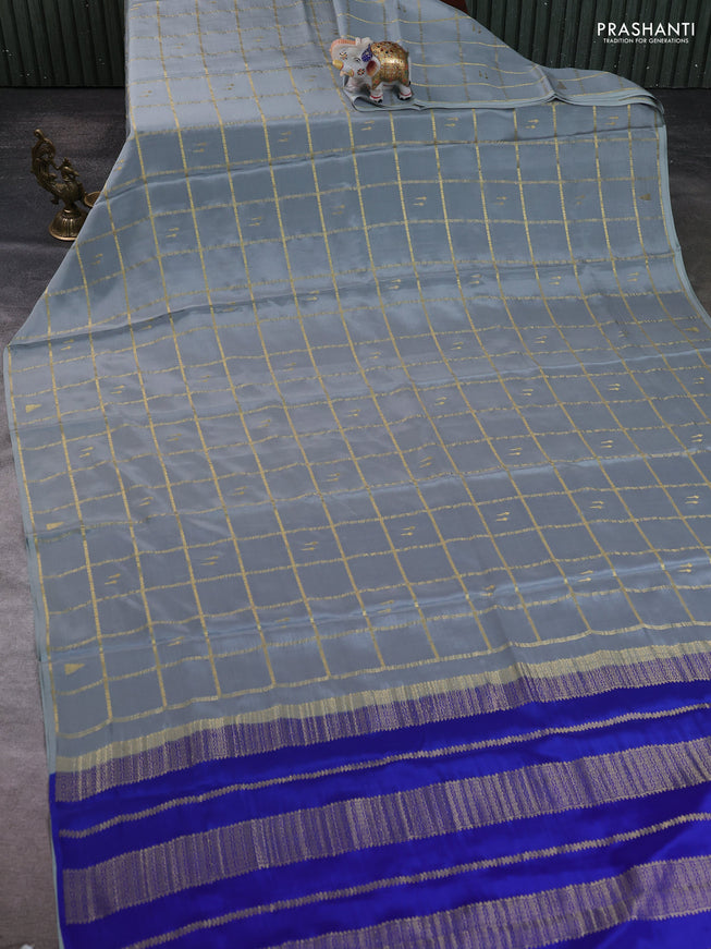 Pure mysore silk saree pastel blue shade and royal blue with allover zari checks & buttas in borderless style