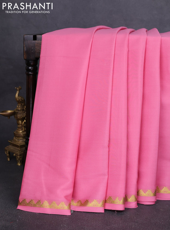Pure mysore silk saree mild peach pink with plain body and temple zari woven border