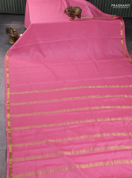 Pure mysore silk saree mild peach pink with plain body and temple zari woven border