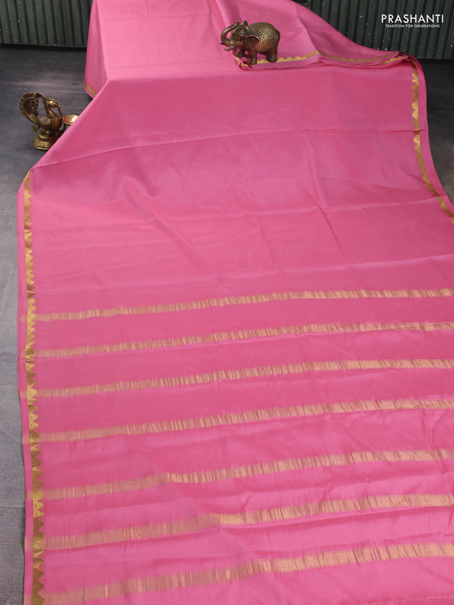 Pure mysore silk saree mild peach pink with plain body and temple zari woven border