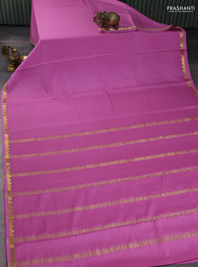 Pure mysore silk saree mauve pink with plain body and temple zari woven border