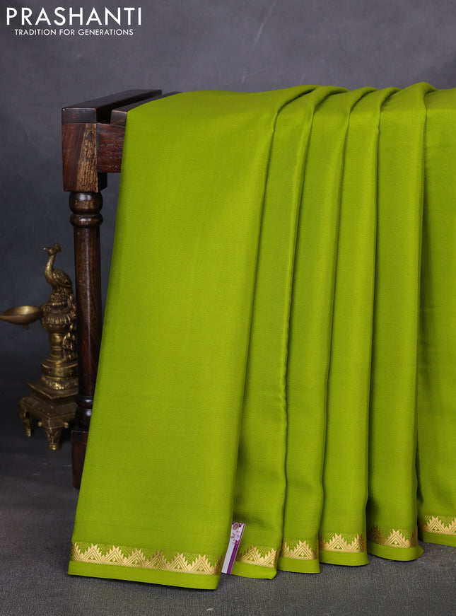 Pure mysore silk saree light green with plain body and temple zari woven border