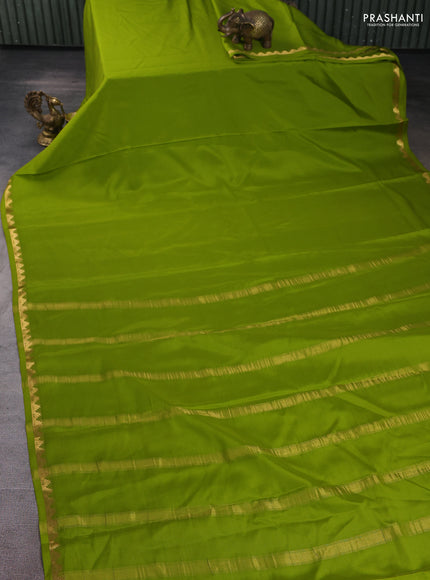 Pure mysore silk saree light green with plain body and temple zari woven border