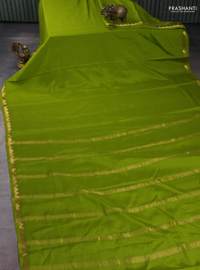 Pure mysore silk saree light green with plain body and temple zari woven border