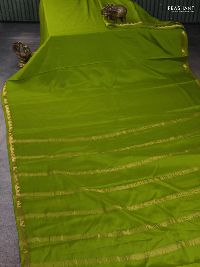 Pure mysore silk saree light green with plain body and temple zari woven border