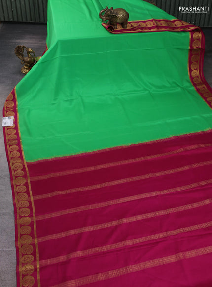 Pure mysore silk saree green and dark pink with plain body and paisley zari woven border