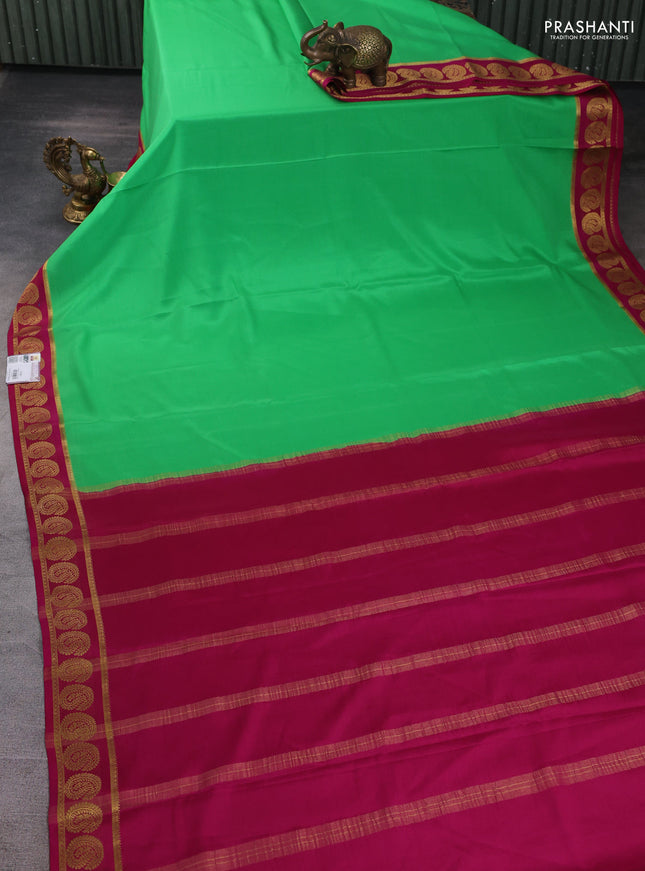 Pure mysore silk saree green and dark pink with plain body and paisley zari woven border