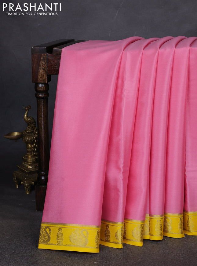 Pure mysore silk saree mild peach and yellow with plain body and zari woven border