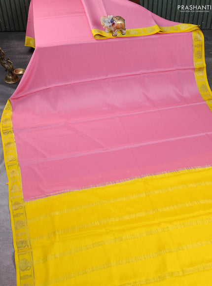 Pure mysore silk saree mild peach and yellow with plain body and zari woven border