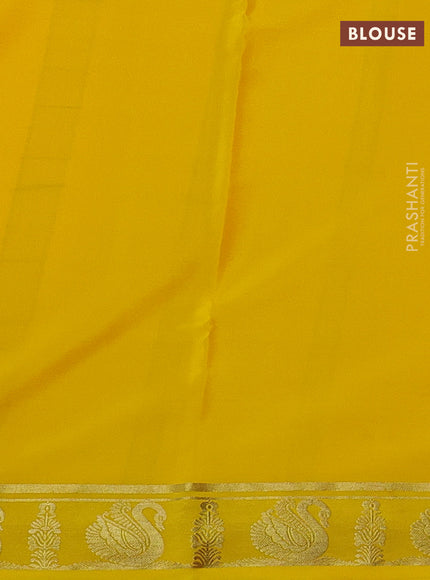 Pure mysore silk saree mild peach and yellow with plain body and zari woven border