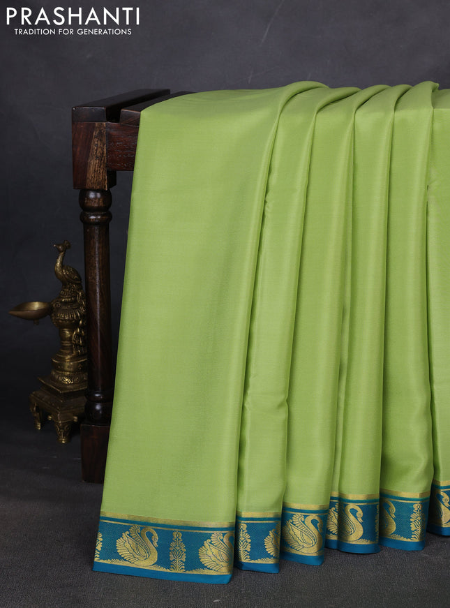 Pure mysore silk saree pista green and peacock green with plain body and zari woven border