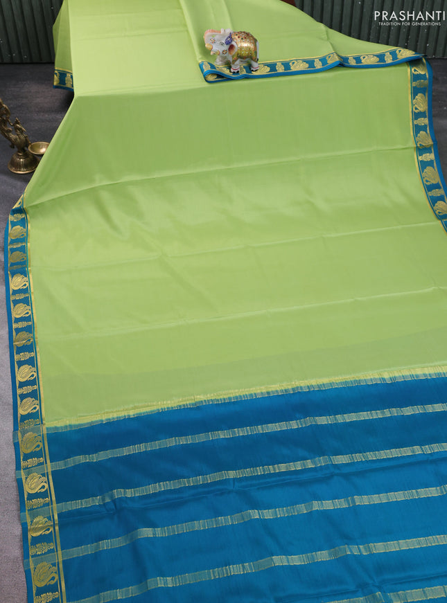 Pure mysore silk saree pista green and peacock green with plain body and zari woven border
