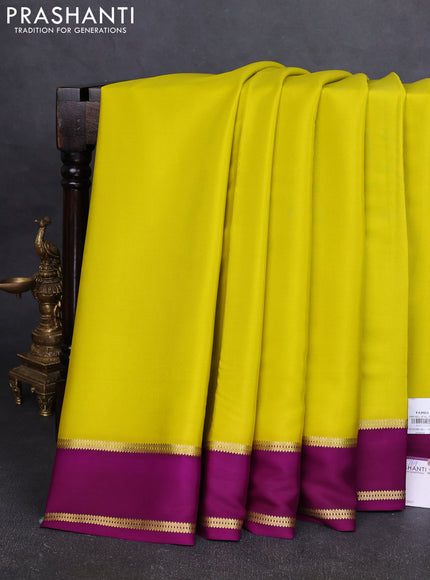 Pure mysore silk saree lime yellow and purple with plain body and rettapet zari woven border