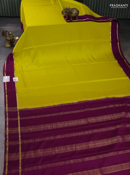 Pure mysore silk saree lime yellow and purple with plain body and rettapet zari woven border