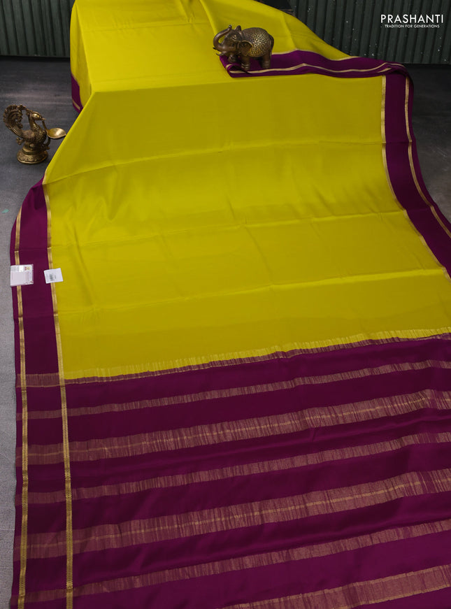 Pure mysore silk saree lime yellow and purple with plain body and rettapet zari woven border