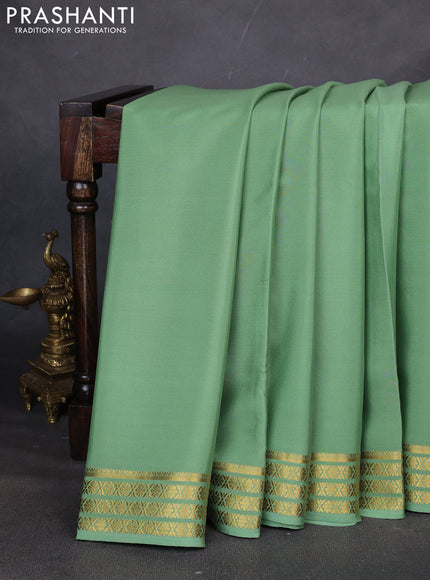 Pure mysore silk saree pastel green with plain body and zari woven border