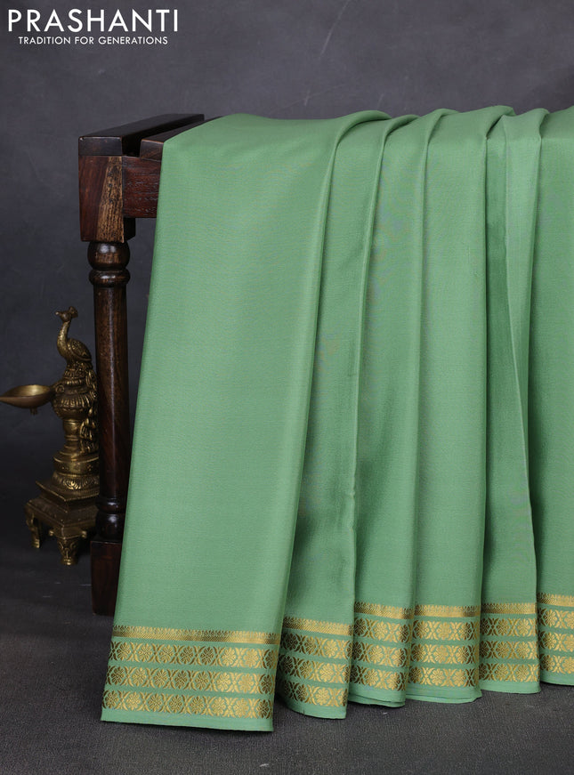 Pure mysore silk saree pastel green with plain body and zari woven border