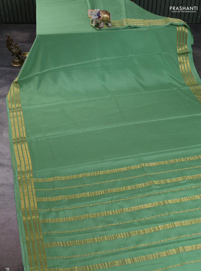 Pure mysore silk saree pastel green with plain body and zari woven border