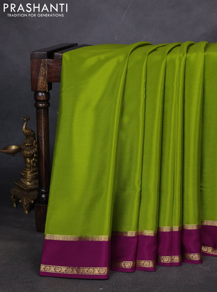 Pure mysore silk saree mehendi green and purple with plain body and rettapet zari woven border