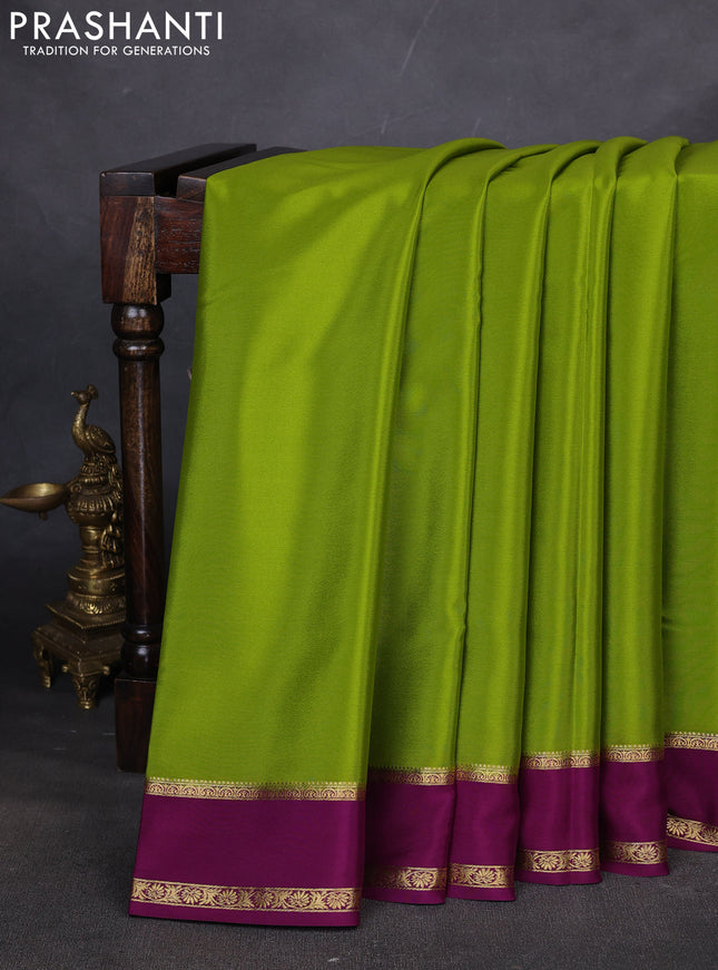 Pure mysore silk saree mehendi green and purple with plain body and rettapet zari woven border