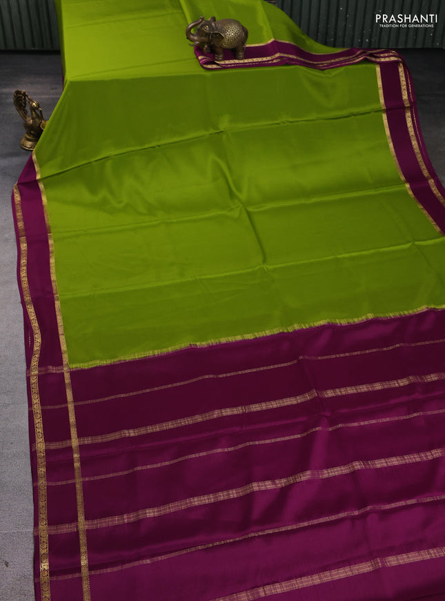 Pure mysore silk saree mehendi green and purple with plain body and rettapet zari woven border